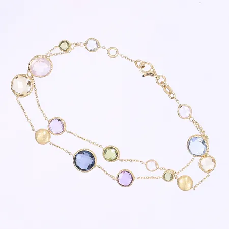 Armband med färgade, fasetterade stenar, dubbelradig, 19 cm, bredd 3-9 mm, 18K bruttovikt 6,5g Vikt: 6,5 g