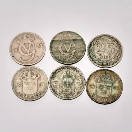 6st 25öres mynt i silver, vikt 13,94g.