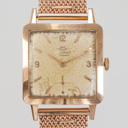 Herrur Movado, 18K, hammarautomat, 28,5x28,5mm, skadad/fuktskadad urtavla, boettnr: R8442/A2147982, länk i 14K,  total längd ca 17,5-18cm, bruttovikt: 71,2gr