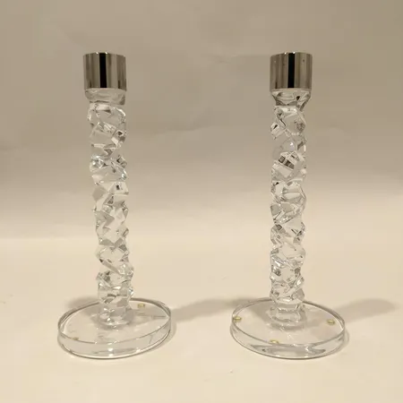 Ett par ljusstakar, Carat, Lena Bergström för Orrefors, höjd ca 24,5cm, detalj i rostfritt stål, stearinrester, klisterrester