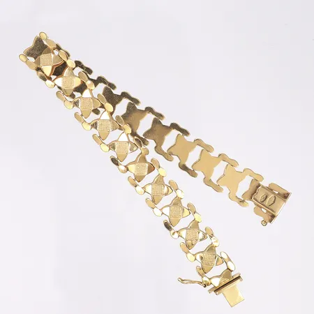 Armband, längd 18,5cm, bredd 11mm, bruksslitage, 18K  Vikt: 15,3 g