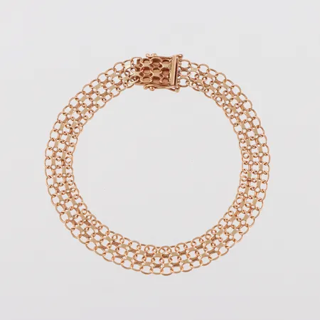 Armband X-länk, längd ca 18.5 cm, bredd 7.5 mm, Clareus Guldsmeds AB, 18k. Vikt: 8,3 g