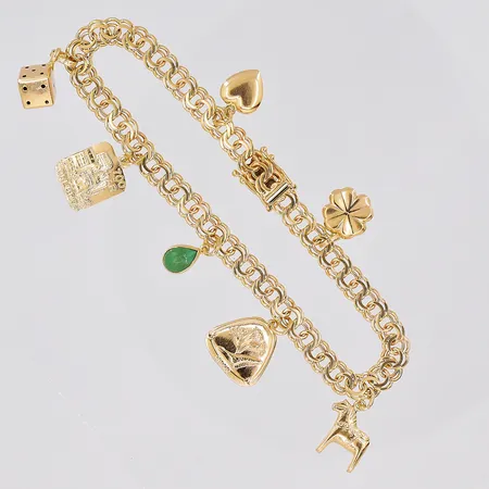 Armband Bismarck, 19cm, bredd 5,4mm, 7 berlocker, 18K Vikt: 15 g