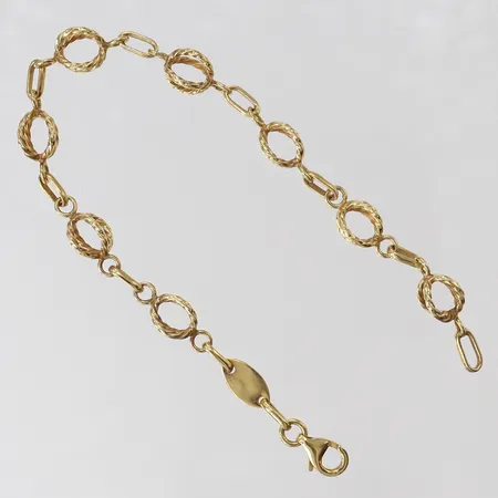 Armband, längd 19,5cm, bredd 3,5-6,5mm, 14K.  Vikt: 9,5 g