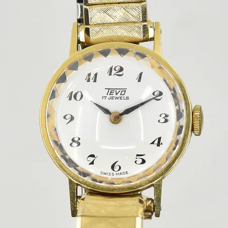 Damur Tevo, boett Ø22 mm, manuell, boettnr 7027, defekt krona/går ej att vrida upp, flexband i doublé, bruttovikt 30,2g, 18K.