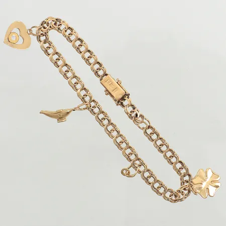 Armband Bismarck, längd 19cm, tre berlocker, en ögla saknar berlock, 5,2mm, Andrens Guldvaror, år 1963, 18K   Vikt: 10,5 g