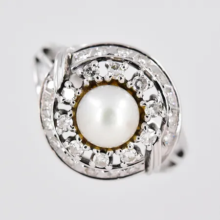 Ring vitguld, diamanter ca 0,25ctv, stl 18½, Ø 15,2mm, 18K Vikt: 6,3 g