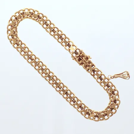 Armband, X-länk, längd 20cm, bredd 6,30mm,  berlock pärla, Norens guldatelje Hägersten. år 1972, 18k  Vikt: 14,6 g