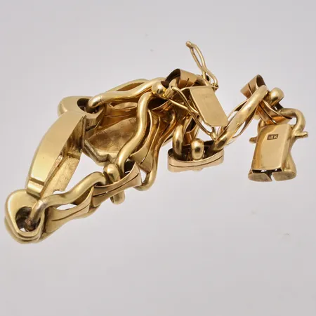 Defekt guld, 18K, vikt 20,89g.