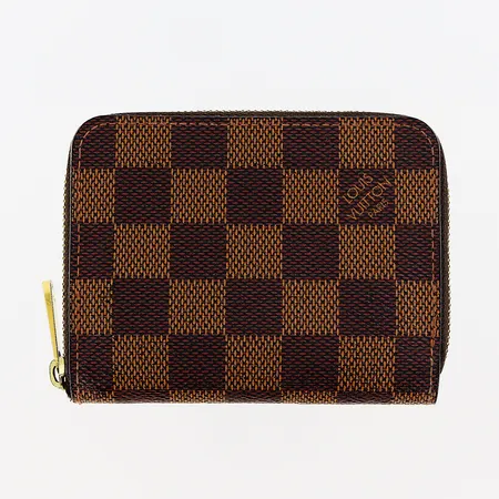 Plånbok Louis Vuitton "zippy coin", N63070, Damier Ebene, datumkod TS5106, ca 8,5x11cm, 9 fack, beslag i gulmetall, mindre defekt på kortfack, övrigt i åldersbetingat gott skick, kvitto Louis Vuitton Köpenhamn Januari 2017, dustbag, box.