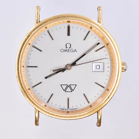 Herrur Omega, quartz, datum, Ø33 mm, graverad boett, 18K. Bruttovikt 21,7g.