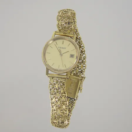 Damur Tissot, längd 17,5 cm, bredd 1 cm, diam 24 mm, 18K, bv 24,5 gr. Nytt batteri behövs