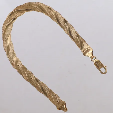 Armband flätat, längd 18,5cm, bredd 6,5mm, 18K  Vikt: 9,7 g