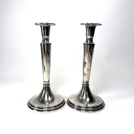 Ljusstakar, paret, höjd 20cm, tillv. Tenn & Silver Ab, Västra Frölunda 1964, gipsfyllda, ena ljusstaken böjd, slitage, silver 830/1000 Bruttovikt: 508,8g Vikt: 508,8 g