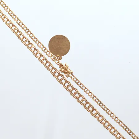 Collier med berlock, doserad Bismarck, längd 47cm, bredd 3-6,2mm,18k Vikt: 15,3 g