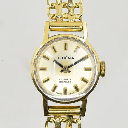 Damur Tidéna med X-länk 18K, boett Ø18 mm, manuell, boettnr 482959, 17 Jewels Incabloc, längd armband ca 15 cm, bredd ca 10 mm, något glappt lås, fungerade vid testtillfället, bruttovikt 22,6g, 18K.