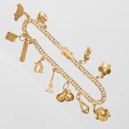 Armband Bismarck, elva berlocker, längd ca 18,5cm, bredd 3,8-26mm, bruksskick, 18K Vikt: 12,6 g