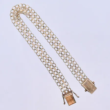 Armband X-länk, längd 19,5 cm, bredd 8 mm, 18K. Vikt: 8,5 g