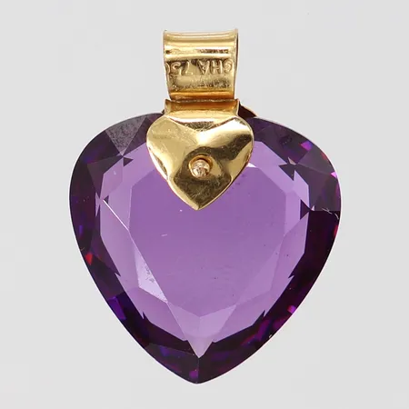 Hänge hjärta med lila sten,  längd inkl ögla ca 20mm, bredd ca 15mm, Guldfynd, 18K Vikt: 4,1 g