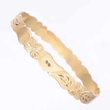 Armring, mönstrad dekor, Ø65mm, bredd 8mm, ojämn skena, 18K Vikt: 16,3 g