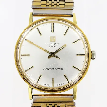 Herrur Tissot Seastar Seven, Ø34mm, manuell, 18K i boett, länk i metall, defekter i plexiglas, ej funktionsgaranti, brv: 56,4gram