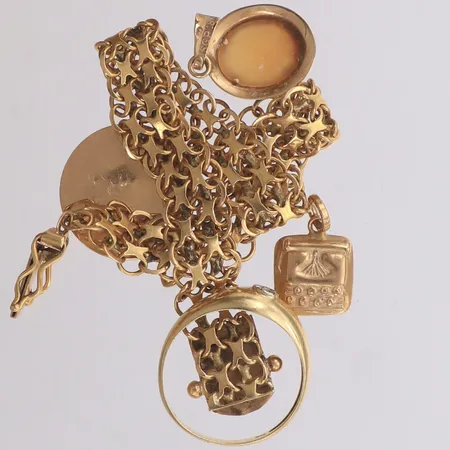 Diverse guld, defekt, 18K  Vikt: 12,7 g