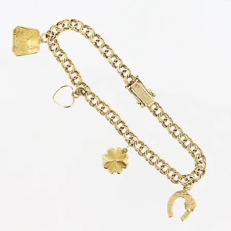 Armband, Bismarck, 18,5cm, bredd 5mm, 4 berlocker, 2 felvända, 18K.  Vikt: 11,9 g