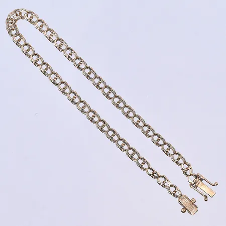 Armband Bismarck, längd 20,5 cm, bredd 4 mm, slitna länkar och en vriden länk, 18K. Vikt: 5,8 g