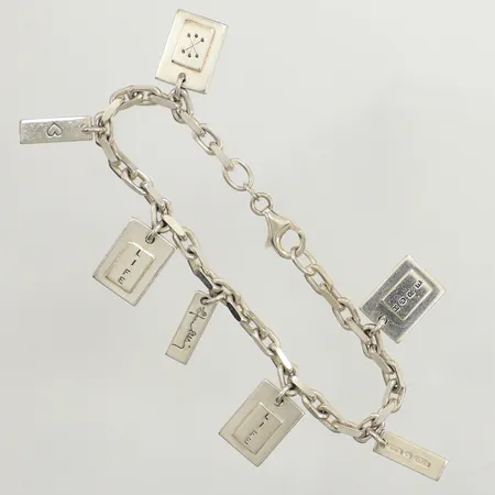 Armband med 7 berlocker, Efva Attling, längd ca 19cm, bredd ca 4mm, bruksskick, 925/1000 silver Vikt: 28,5 g