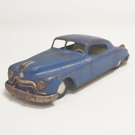  Leksaksbil plåt, Arnold Mand in Germany U.S. Zone, skadad/rostig