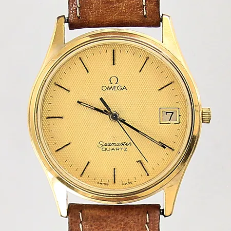 Herrur Omega Seamaster quartz, doublé/stål ref-nr: 196.0216, serie-nr: 396.0919, kaliber 1332, Ø34mm, datum, läderband ej original med slitage, mineralglas samt boett med repor, lös krona, går ej att ställa minutvisare, bakboett sitter något löst, inga tillbehör