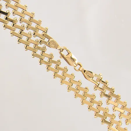 Collier, längd 42,5cm, bredd 7,5mm, 18K Vikt: 23,8 g