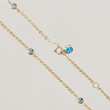 Fotlänk, 22,5-25cm, dekor av ögon, 14K 2,3g.