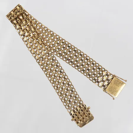 Armband X-länk, längd: 22cm, bredd: 14mm, Nils-Eric Södermark NSE Guldvaror, Köping 1964, 18K guld. Vikt: 26 g