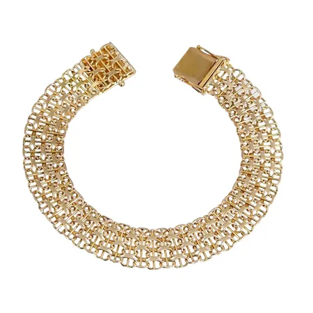 Armband X-länk med stav, 18K guld, Clareus Guldsmeds Ab, Stockholm, längd knäppt 19,0 cm, bredd 12 mm, fint skick Vikt: 15,3 g