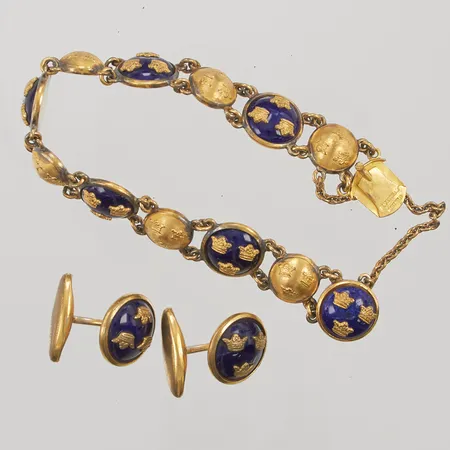 1 Armband "Tre Kronor", ca 19cm, bredd:14mm, emaljdekor, 2 Manschettknappar, Ø16mm, förgylld metall.