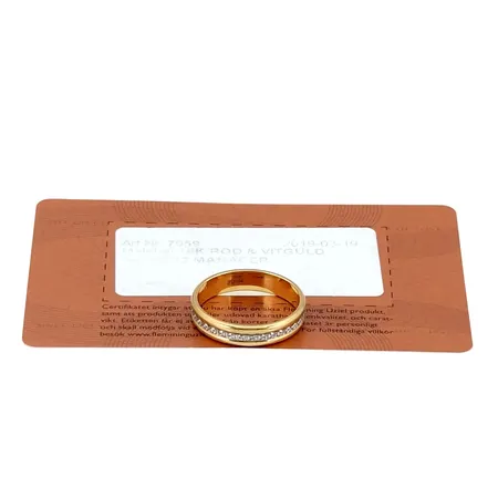 Ring, 18K guld, tvåfärgad modell, Flemming Uziel AB (FU), Ø19,0 mm, bredd 4,3 mm, invändig gravyr, certifikat Vikt: 5 g