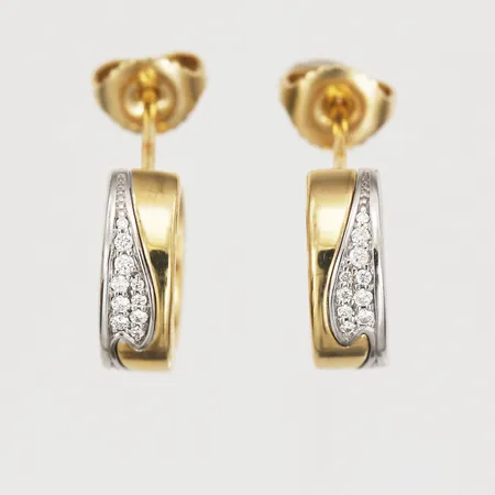 Ett par örhängen, "Fusion" Georg Jensen, med diamanter, enligt certifikat 0,18ctv, etui, ytterkartong, vitguld och gulguld, 18K guld. Vikt: 5,8 g