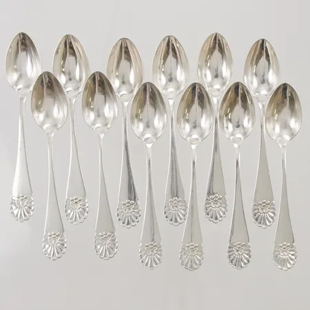 12 Moccaskedar, 10cm, gravyr, 830/1000 Silver 104,4g.