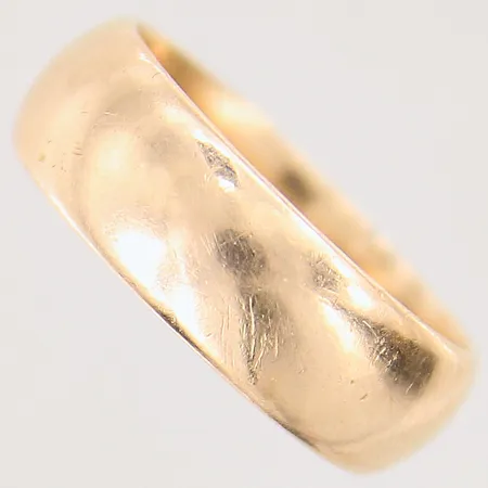 Ring slät, stl: 19, bredd: 7mm, gravyr, 18K Vikt: 10,2 g