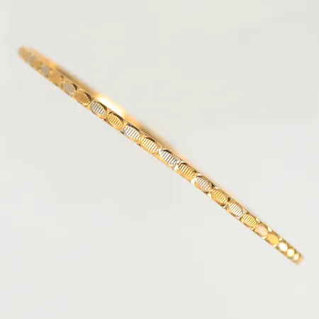 Armring tvåfärgad, omkrets 20cm, bredd 2 mm, ojämn, 21K Vikt: 7,5 g
