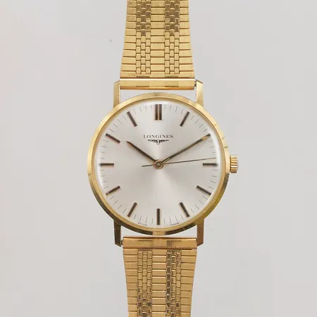 Herrur Longines 18K, 33mm, manuell, ref:1108.865, Cal.6942, verknr:55179603, band i doublé, graverad bakboett.