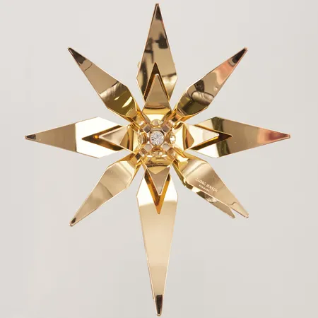 Juldekoration Georg Jensen, Christmas Collectibles, "Star of Bethlehem", Design:Rebecca Uth, år 2012, ca 12cm, förgylld mässing, originalschatull samt katalog. 