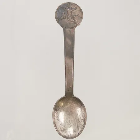 Sked, 13cm, dekor av katt med stövlar, 830/1000 Silver 28,0g.