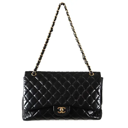 Väska, Chanel single flap bag, svart skinn med guldfärgade beslag samt kedja, numrerad 13296986, ca 33x20x12cm,  slitage, ytliga märken,  kvittokopia av reparation, dustbag. 