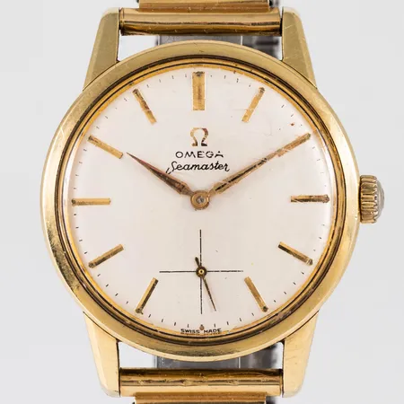 Herrur Omega Seamaster. Boett Ø 35 mm, manuell, guld på stål, rejält repigt plexiglas (original), anfrätta visare, flexband i stål, inga tillbehör. Cal 268 Ref 18689577 boett 14389-10.