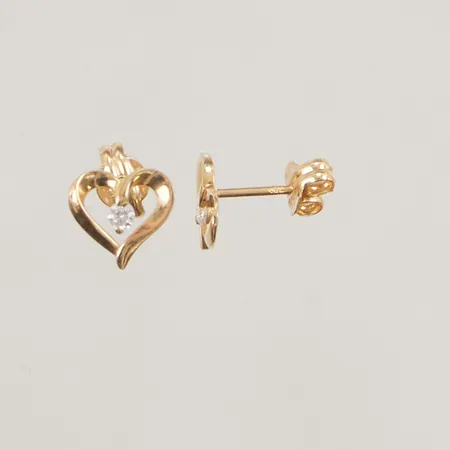 Ett par örhängen, 7mm, vita stenar, 18K 0,7g.