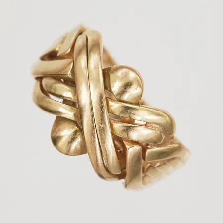 Ring, svetsad pusselring, stl: 20¼, bredd: 4-15mm, bruksslitage, 14K guld. Vikt: 9,9 g