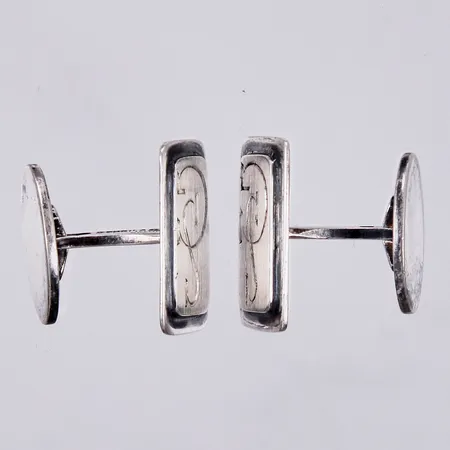 Ett par manschettknappar, Borgila, Sweden, år 1956, längd: ca 2,2cm, bredd: ca 12mm, graverade med monogram SG, 925/1000 Silver Vikt: 15,9 g