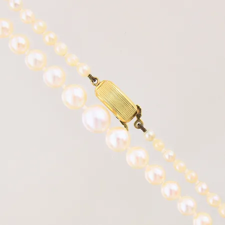 Pärlcollier med odlade sötvattenpärlor, doserat, längd 45cm, bredd 3-7mm, lås i 18K, bruttovikt: 11,9g Vikt: 11,9 g